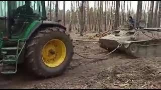 War in Ukraine. Ukrainian Tractor Forces. John Deere and Russia's MT-LB