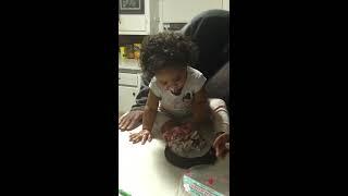 Ari eating her bday cake