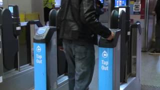 Tapping your Compass Card on SkyTrain