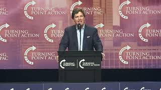 Tucker Carlson promotes Donald Trump as "dad" at bizarre Georgia rally