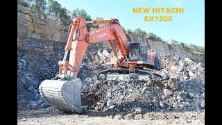 New Hitachi EX1200 loading rock