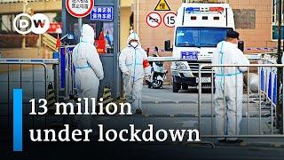 China: Highest number of daily COVID cases since Wuhan outbreak | DW News