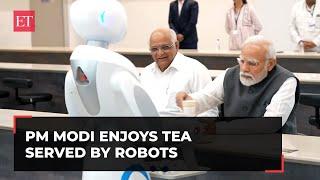 Gujarat: PM Modi enjoys cup of tea served by the robots at Science City, Ahmedabad