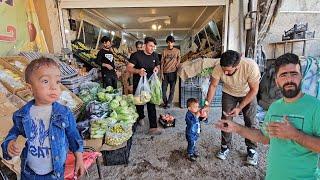 Saif Ela and his son Arad went to the city to bring food and building materials