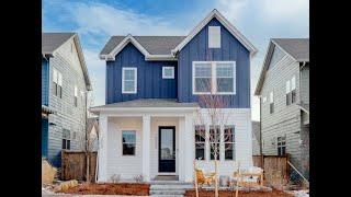 10050 E. 59th Dr. - Central Park, Denver | David Weekley w/ a Striking Farmhouse Elevation