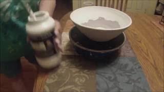 Mary Potters Banding wheel glaze brushing