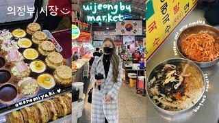 uijeongbu market korean street food  spicy noodles, okonomiyaki, rice cakes, glutinous rice donuts