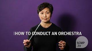 How do you conduct an orchestra?