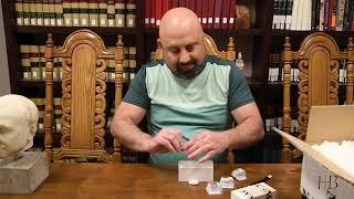 Coin Dealer Aaron Berk unboxes the world's rarest and most valuable ancient coin.