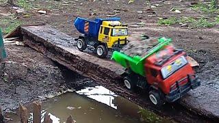 TRUK OLENG MUAT PASIR TERGULING DI JEMBATAN