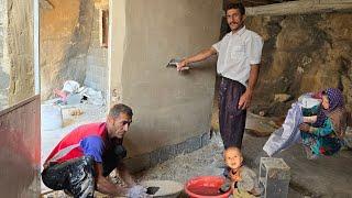 "Living in a mountain cave: the kohgol family's effort to complete the plaster of the house wall"