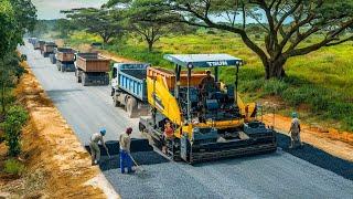 Road construction technology in remote areas using heavy equipment like gravel paving, & dump trucks