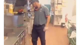 Burger King employee adding “touch” to your fries