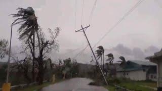 Latest typhoon to lash Philippines whips towering tidal surges, sends hundreds of thousands fleeing