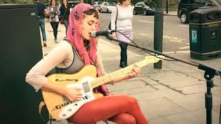 Guitar Street Performers Gabriela Eva Playing Live Music