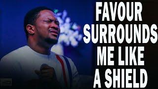 FAVOUR SURROUNDS ME LIKE A SHIELD | EVANG.LAWRENCE OYOR