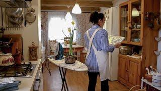 Spring routine in a Cozy tiny House. Family together. Cozy pie and a piece of fabric