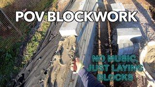 POV concrete block laying