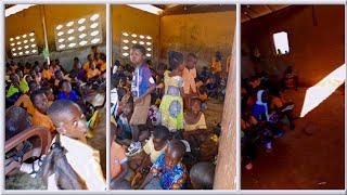 SCHOOLS IN GRIM: NORTH EAST: CHILDREN IN KULGONA STUDY ON BARE FLOOR AND STONES