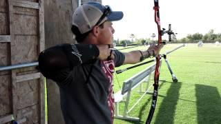 Jake Kaminski demonstrates perfect form with the Astra Archery Shot Trainer