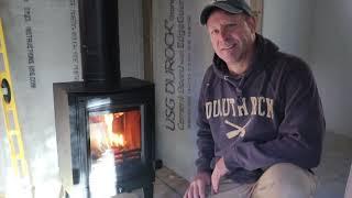 Installing a wood stove in my off grid tiny cabin bunkhuse.