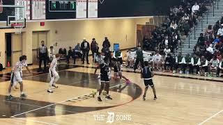 Ypsilanti Lincoln 2025 PG Dante Wimberly makes a tough layup vs. Ann Arbor Huron