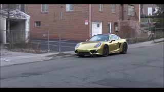 PEGADINHA PORCHE DOURADO DANDO CHOQUE