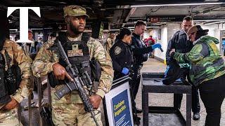 National Guard soldiers patrol New York subway