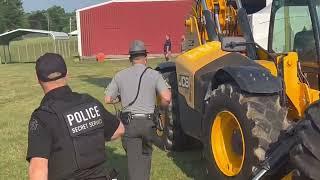 Law Enforcement Officers Struggle to Get Through Fences Amid Trump Shooting