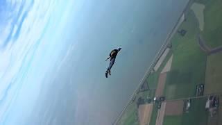 Slow-mo fliptwist before pulling his parachute