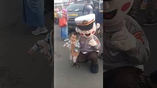 fathan photo with clown police officer