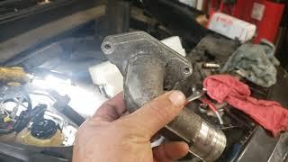 replace thermostat on 2014 Infiniti  QX60
