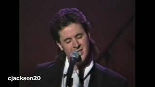 Vince Gill and Carl Jackson, singing, "Sight For Sore Eyes"