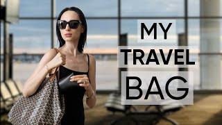 What's in my travel bag: the essentials I carry with me on the airplane | Jamila Musayeva