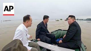 North Korean media shows Kim Jong Un on boat inspecting impact of floods