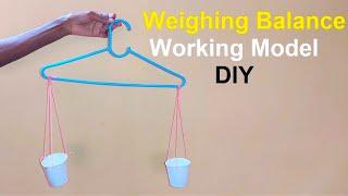 how to make weighing balance working model simple and easy using plastic hanger and paper cups | DIY