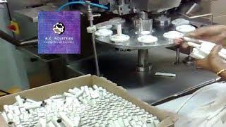 Tube filling & Sealing machine.