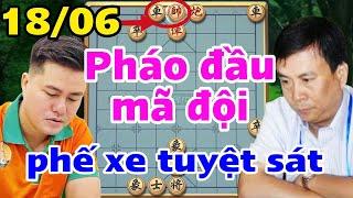 Chess player Lai Ly Huynh with his masterpiece of broken chariot attacking King Lu Kham