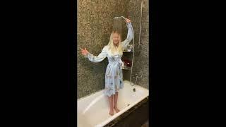 Clothed shower girl