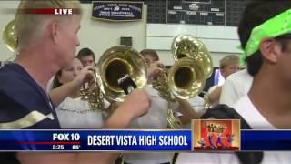 Reporter drops his microphone down tuba on live TV