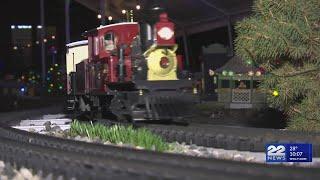 Man in West Springfield Displays Holiday Train Set to Community