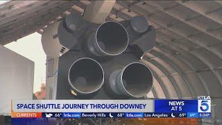 Crowds gather to see “Inspiration” space shuttle prototype travel through Downey streets