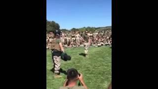 Female Marine Vs Male Marine in a round of pugile sticks.