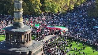 Aerial shot of crowded square and surrounding street during Iranian protest gathering against regime