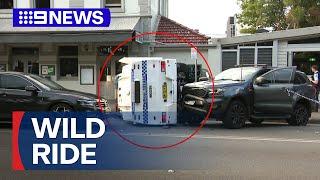 Manhunt underway after police car flipped during pursuit in Newcastle | 9 News Australia