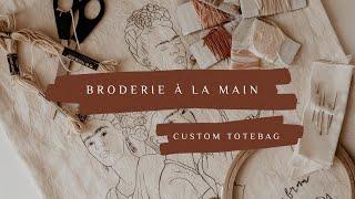 Broderie à la main sur un totebag