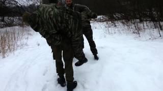 Переноска раненого