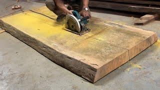 Skillful Carpenter Cutting Large Wooden Panels - Design Manufacture Of Sample Bed From Solid Wood