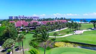 4k Aerial   Beautiful view of Golf Course and resort next to ocean