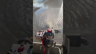 Snowblower engine slinging muddy water.